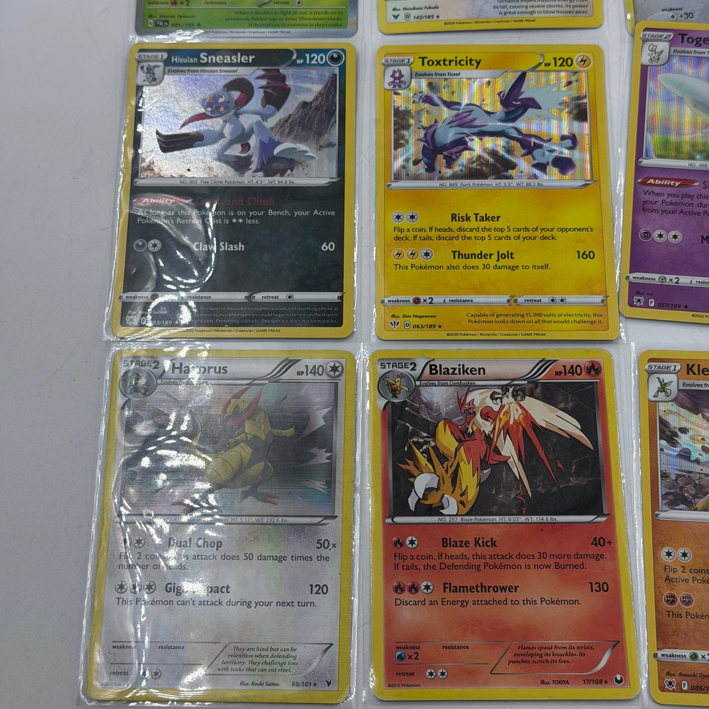 Pokémon TCG Holo 25 Card Bundle Featuring Charizard 20/149